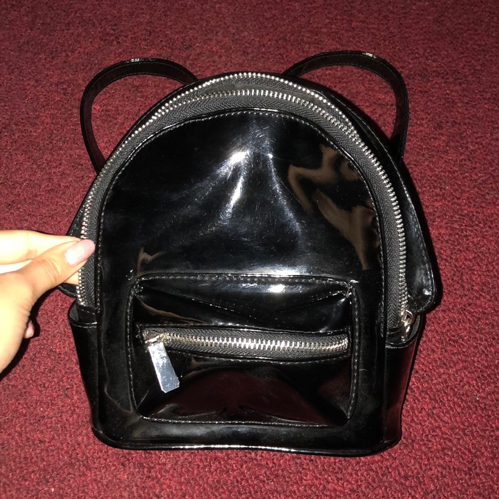 Small black leather backpack